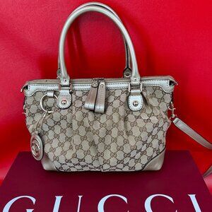 Gucci Sukey GG Pattern Canvas Gold Leather Handbag Purse With Charm And Strap